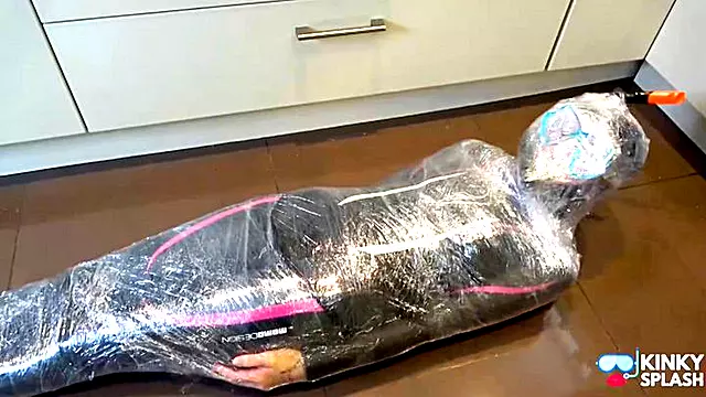 Mummified in Wetsuit and Snorkel - MOV