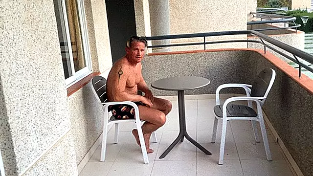 Balcony Biceps and Spanish Sunshine: The Great Arm-Wrestle Showdown