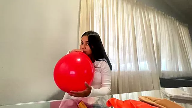 Akina blows balloons at her dining table part 2 copy