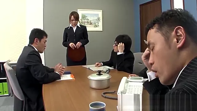 Sexy Asian office girl blows her coworkers