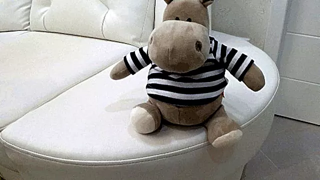 A plush toy on my crossed legs bb