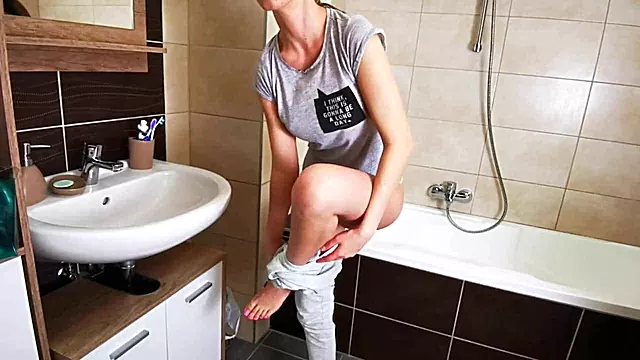 Busty Teen's Steamy Solo Session in the Bathroom