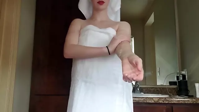 Rubing lotion on tits, ass and feet