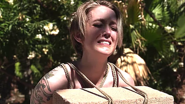 Sexy Slave Kneels In The Sun While Master Punishes Her