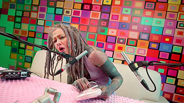 Tattooed model Anuskatzz enjoys lollipop in ASMR style for her channel