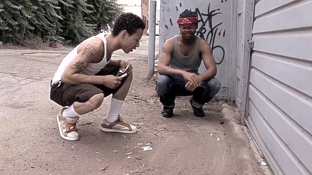 Black thug gives head and gets fucked hard from the back