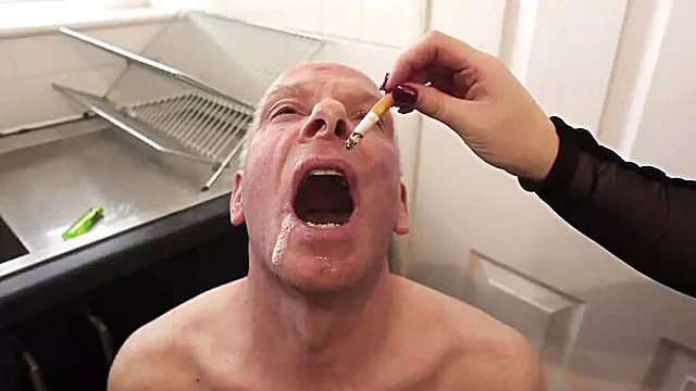 British Femdom Humiliation: Smoking Bitch Uses Slave's Foreskin as Ashtray - Extreme CBT & CFNM Punishment