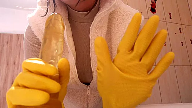 My Stepsister in yellow dishwashing gloves takes a bath with a dildo and lots of white foam and soap