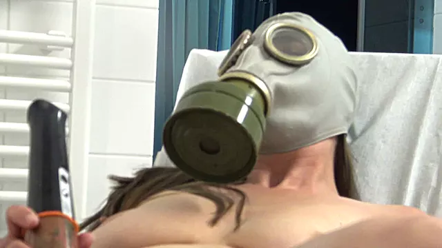 Perverted Fetish Slut Masturbates to Climax in a Gas Mask