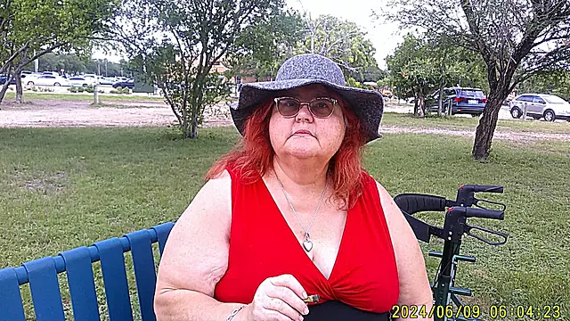 Nurse Vicki Smoking in the Park on a Bench All Dressed up