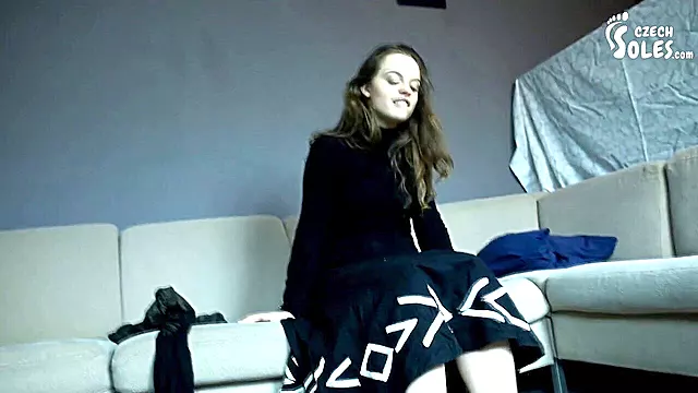 Stunning bare feet of a naughty girl showcasing foot tease and sexy soles