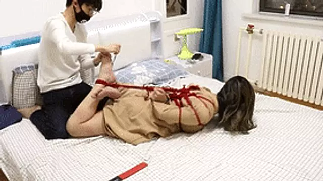 GG09 - Cute barefoot girl being tied up and tickled
