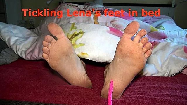 Tickling Lena feet in bed