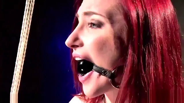 Redhead Endures Extreme Bondage