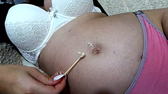 Giantess Stepsister plays with her belly button and then thinks Tiny stepbrother can help her clean her belly button better, so Giantess stepsister uses tiny stepbrother's help