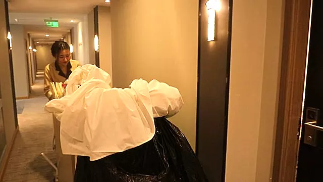 Chinese hotel cleaner's feet were licked and tickled?