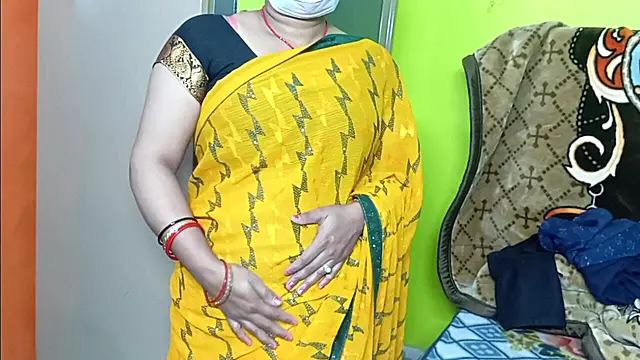 Beautiful Bhabhi Wearing Yellow Sari