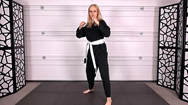 ASHLEY EARNS HER YELLOW KARATE BELT