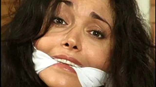 Beautiful Playmate Devin DeVasquez and her pretty bare-breasted friend Antonia struggle bound and gagged together!