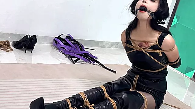 Chinese girls wearing queen costumes play with handcuffs, shackles and full body ties plus Japanese-style strands with oversized mouth balls