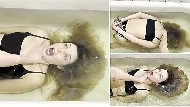 Milana is bound with a rope and held underwater