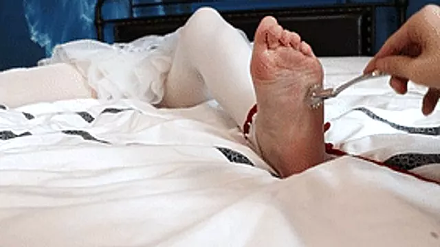 GG10 - Cute twin-tailed maid in white stockings is tied to the bed and tickled.