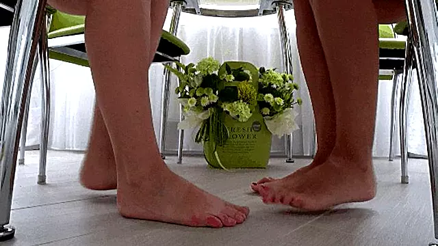 Barefoot fight under the table c