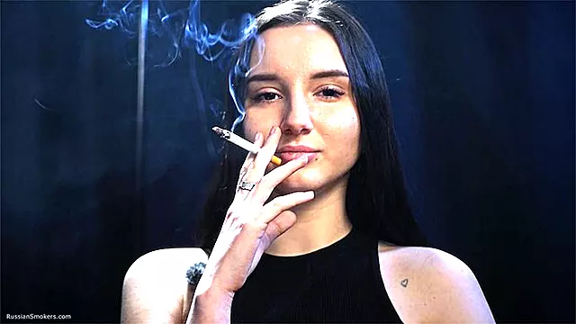 Confident Smoker Slow Drags & Direct Eye Contact