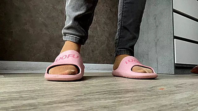 Feet in pantyhose and slippers!