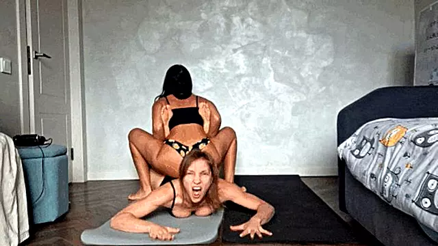 Boston crab submission hold with a camel clutch 7b