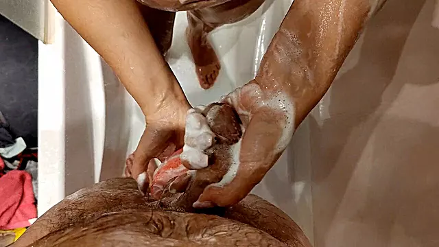 Big-busted girlfriend enjoys a steamy shower session with her stepbrother