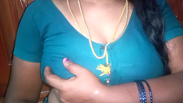 Tamil Aunty Squeezing Her Breasts When She Is Alone and Unable to Control Her Emotions